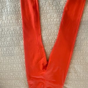 Gently worn lululemon orange leggings. Excellent condition.